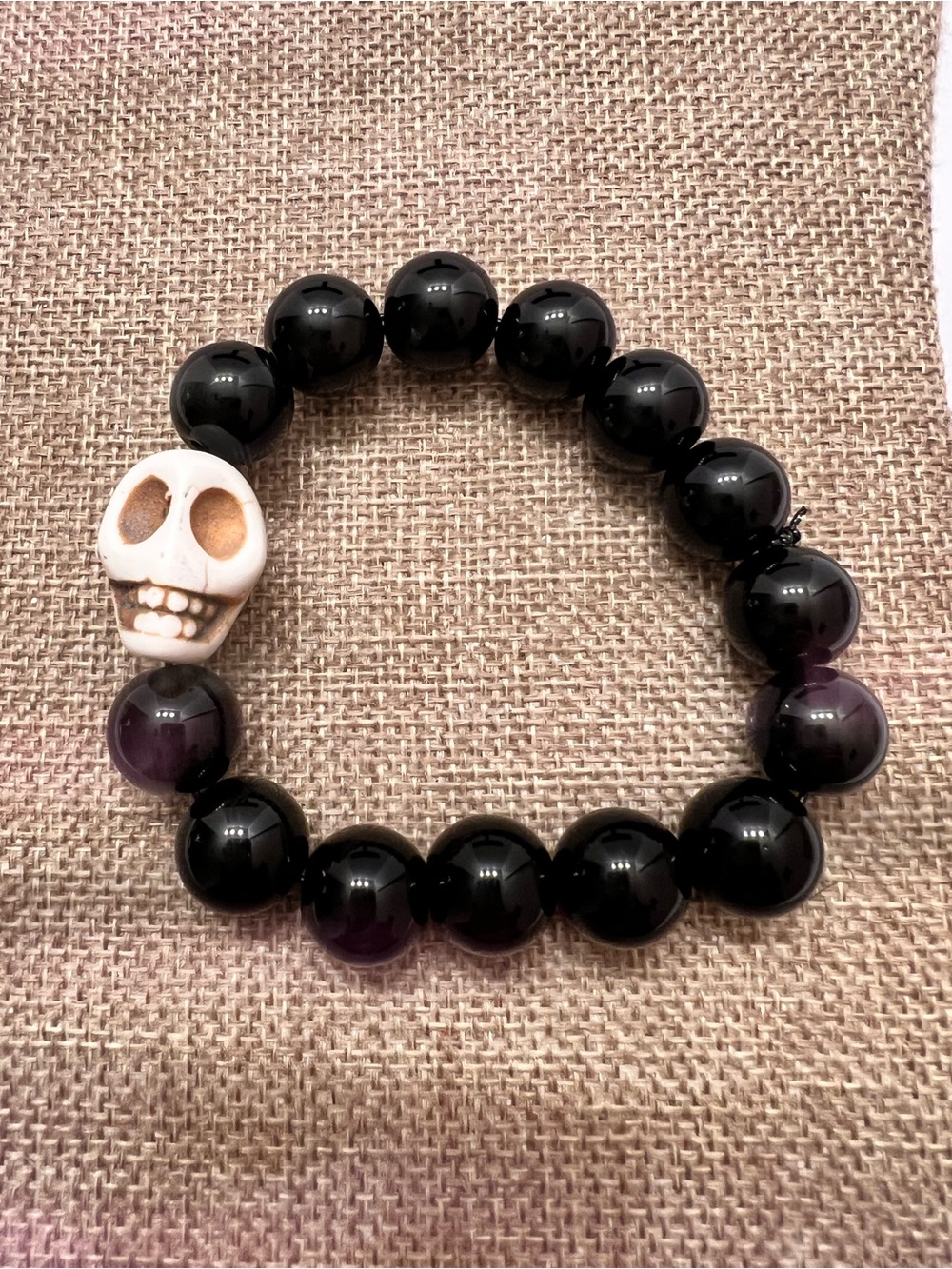 Men's Black Beaded Stretch Bracelet with White Skull Accent